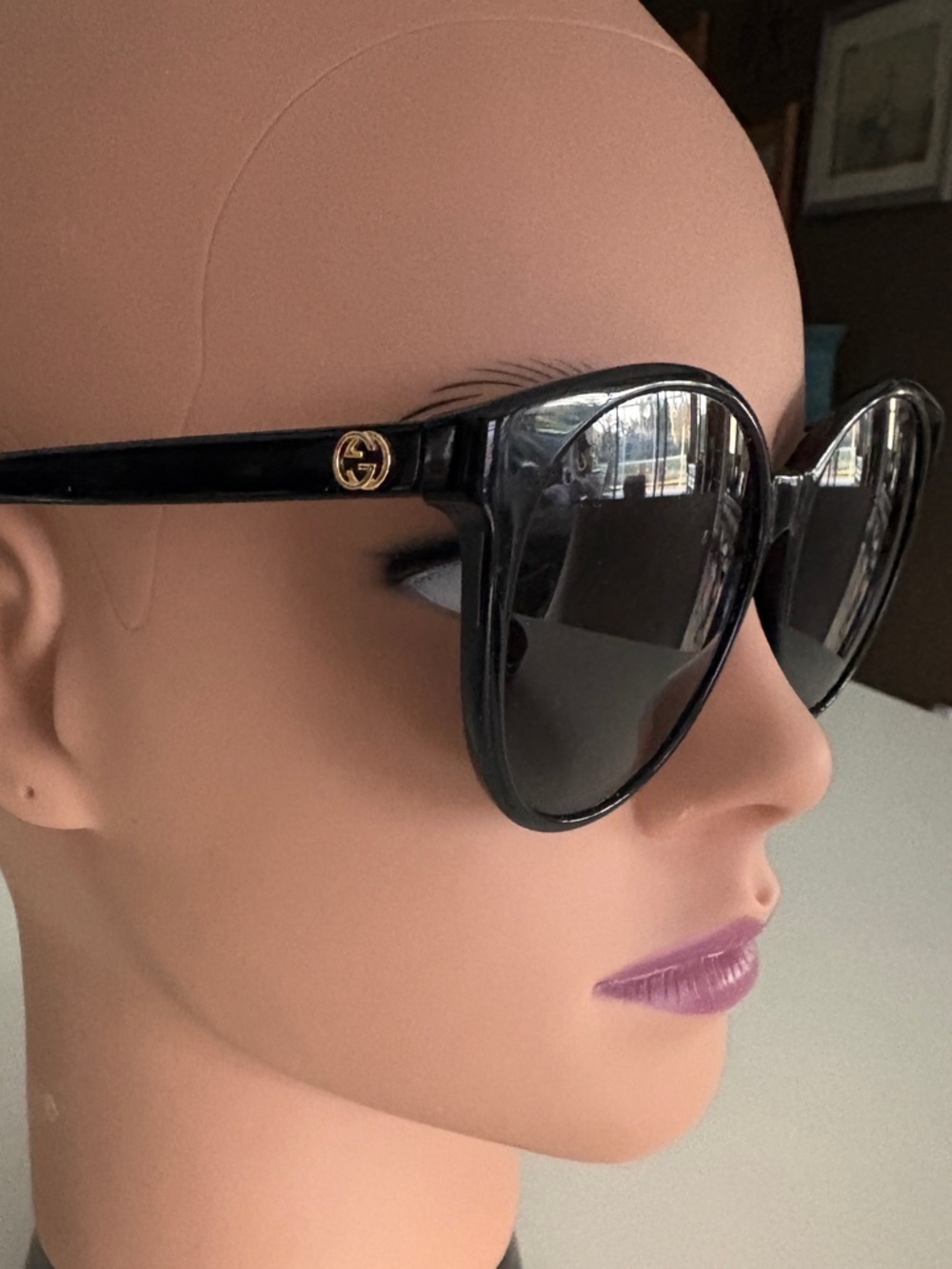 Gucci Black Frame Sunglasses with Gold Logo